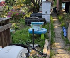 Backyard Dirt Removal – Tight Access, Hand Tools Only